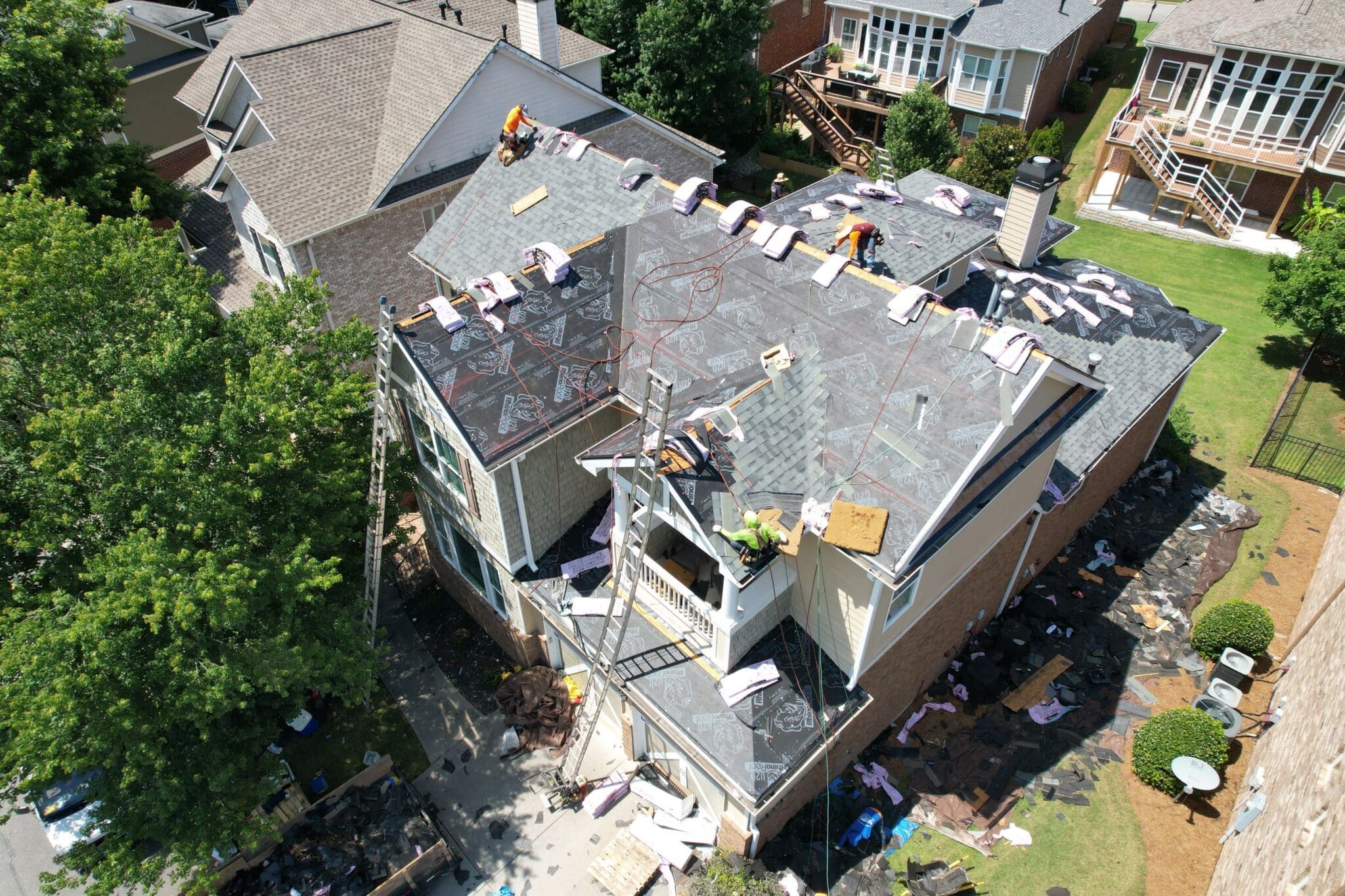 Tear-off and replacement in progress on a Milton GA roof