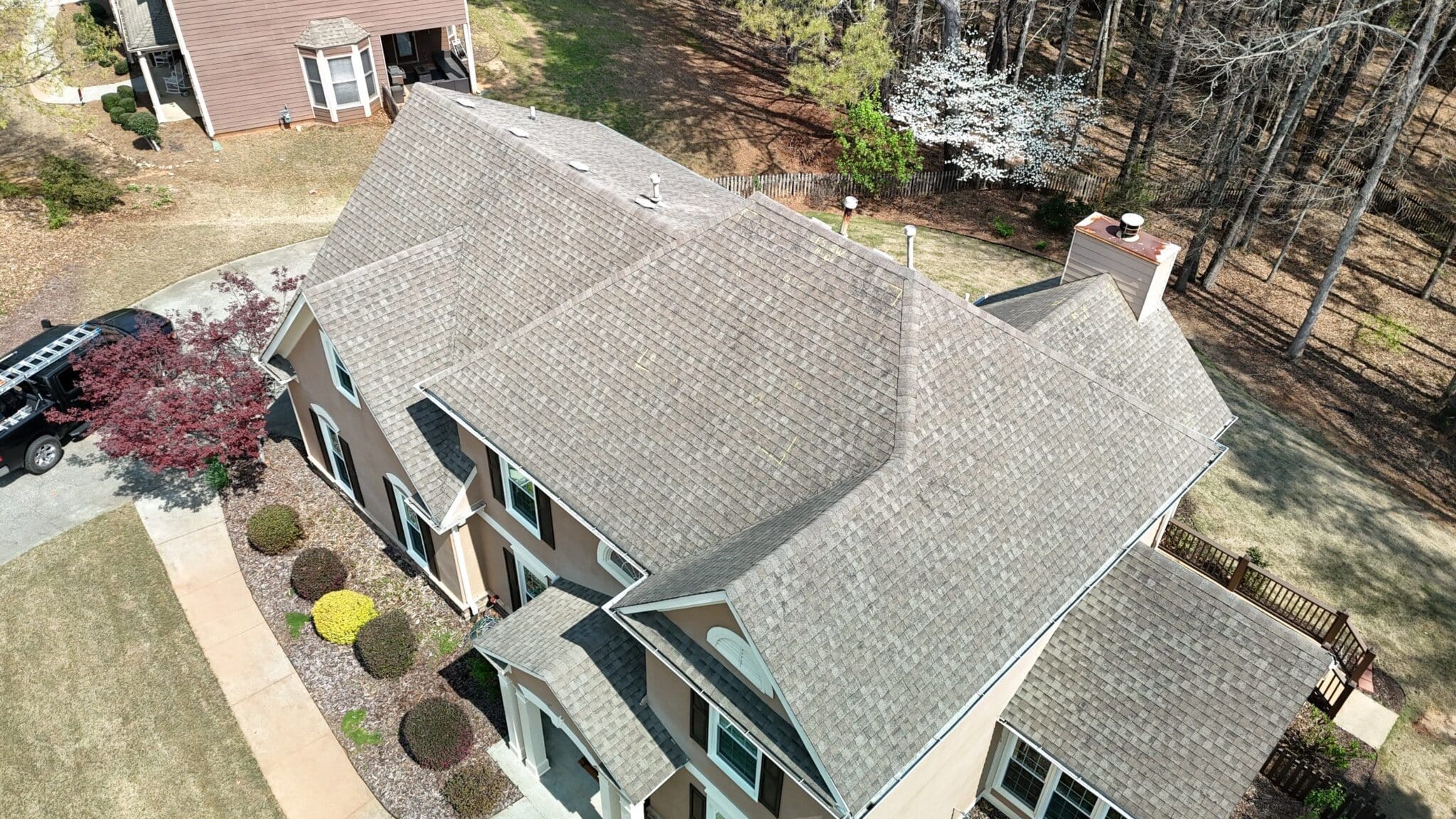 Roof slope marked during hail damage insurance roof inspection in Cumming Georgia