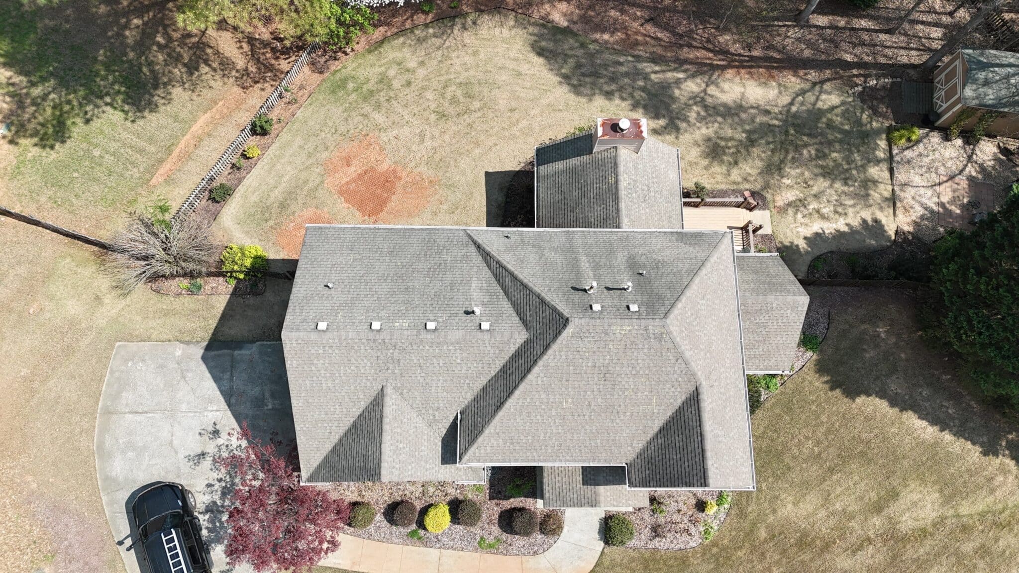 Overhead drone roof inspection for hail damage in Cumming, GA