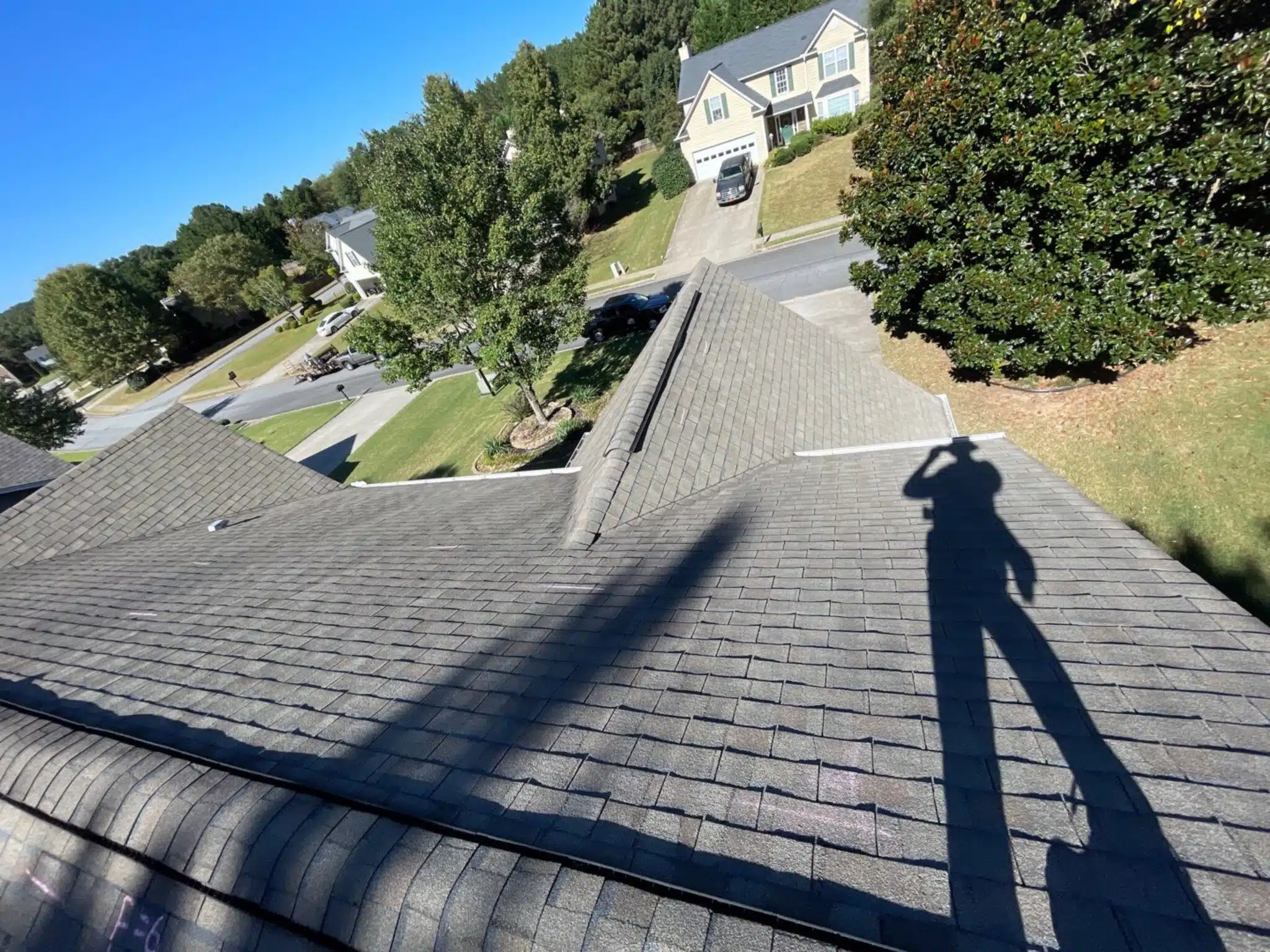 Roof inspection documenting asphalt shingle conditions in Suwanee, GA