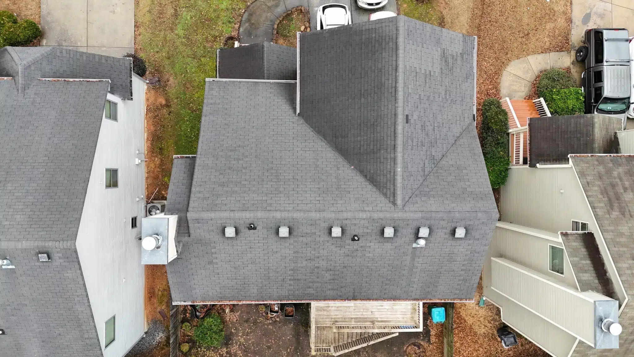 Aerial drone view of a residential roof inspection in Lawrenceville, GA