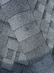 Pipe boot and roof penetration detail on an asphalt shingle roof