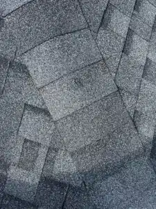 Pipe boot and roof penetration detail on an asphalt shingle roof