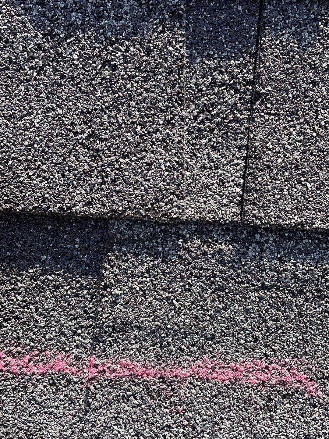 Storm damage line marked in chalk in Alpharetta