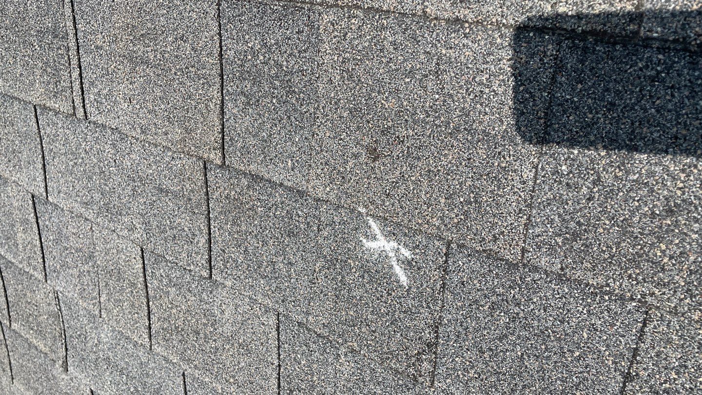 Duluth roof hail documentation photo