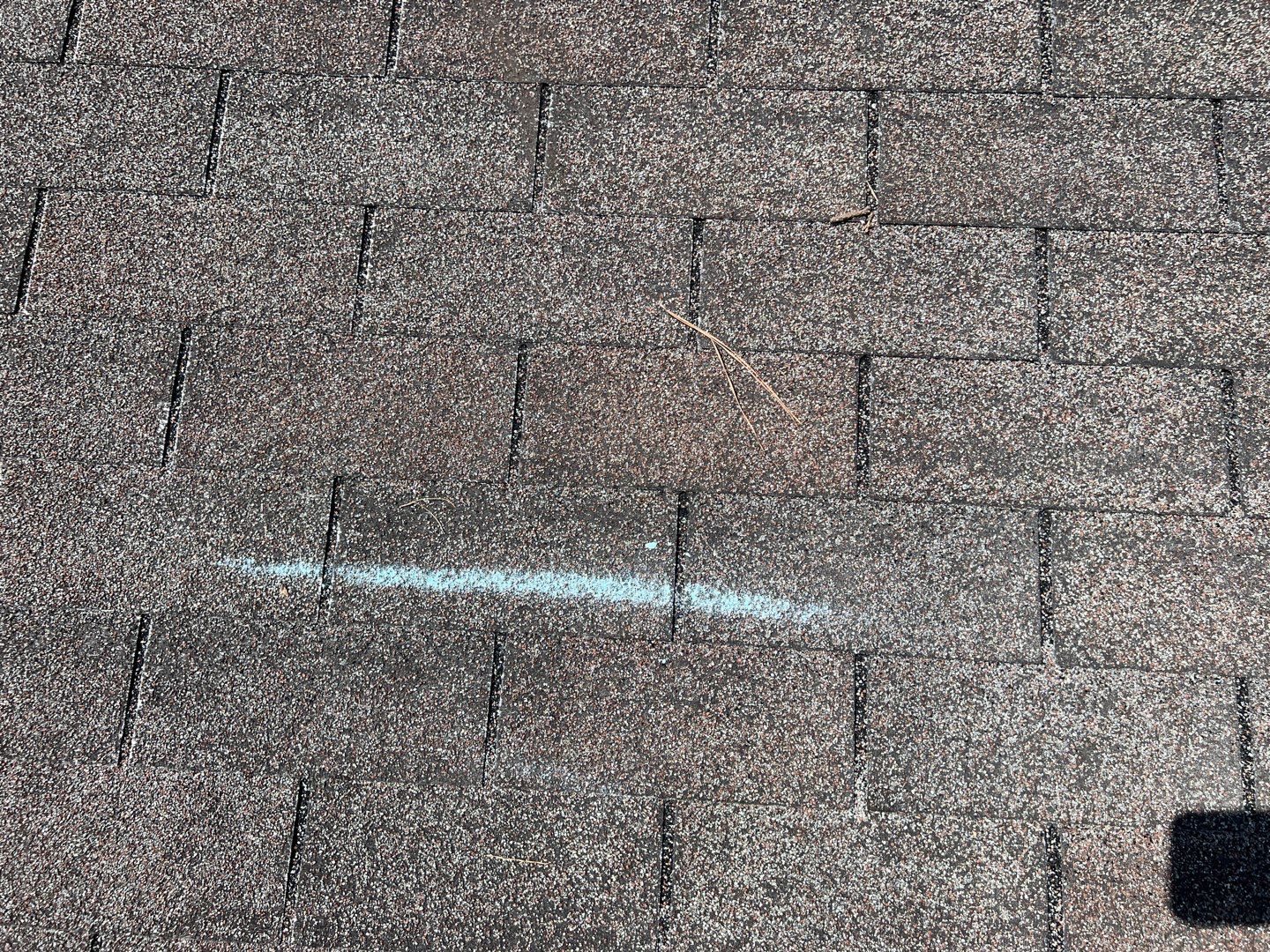 Roswell roof hail documentation photo